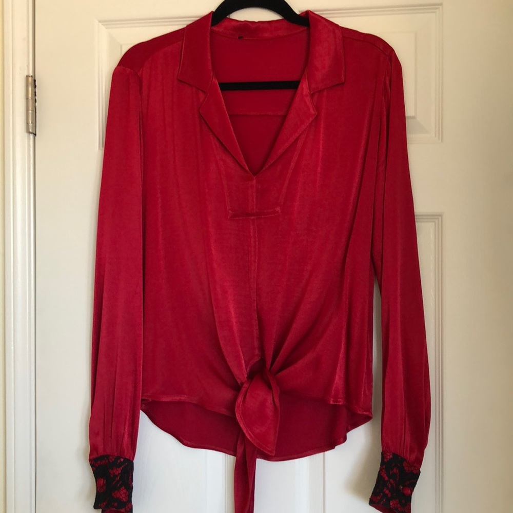 Red fashionable blouse. 100% Rayon.